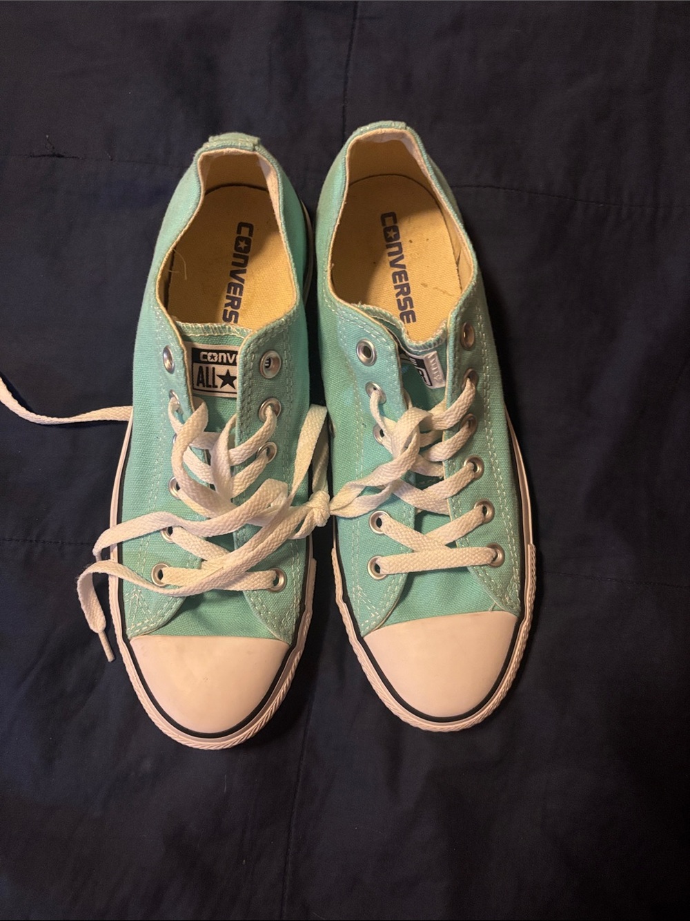 Converse women size 9 / 7 Men.
Mint Green Low Top Sneakers
